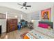 Cozy bedroom with a double bed, dresser, and workspace at 138 Paddington Rd, Venice, FL 34293