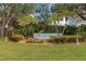 Welcoming community entrance with landscaping and signage at 138 Paddington Rd, Venice, FL 34293