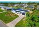 Single story home with pool and landscaped yard at 138 Paddington Rd, Venice, FL 34293