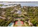 Aerial view of community with a pool, tennis courts, docks and bay access at 1519 Pelican Point Dr # 292, Sarasota, FL 34231