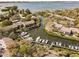 Beautiful aerial view of boat docks and community with waterway access to the bay at 1519 Pelican Point Dr # 292, Sarasota, FL 34231