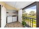 Convenient laundry area with a washer, dryer, storage, and a view to the outside at 1519 Pelican Point Dr # 292, Sarasota, FL 34231