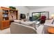Relaxing living room with a view of the deck and stylish decor at 1519 Pelican Point Dr # 292, Sarasota, FL 34231