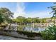 Tranquil marina view with boats and lush greenery at 1519 Pelican Point Dr # 292, Sarasota, FL 34231