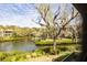 Picturesque water view from the property, showcasing lush greenery and serene waterfront living at 1519 Pelican Point Dr # 292, Sarasota, FL 34231