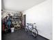 Garage with storage shelving, bicycle rack and floor mats at 1953 Wheeling Ave, North Port, FL 34288