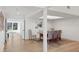 Dining room with light wood floors and a rustic table at 2155 Harbourside Dr # 804, Longboat Key, FL 34228