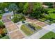 Aerial view of the Bay Isles Beach Club entrance, featuring lush landscaping and a private gate at 2155 Harbourside Dr # 804, Longboat Key, FL 34228