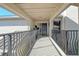 A covered walkway leads to the front door, enhancing curb appeal and providing shelter at 2155 Harbourside Dr # 804, Longboat Key, FL 34228