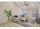 Cozy living room features vaulted ceilings, natural light, and open access to the dining area at 2155 Harbourside Dr # 804, Longboat Key, FL 34228