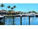 Picturesque marina with boats and yachts docked along the waterfront with clear blue water at 2155 Harbourside Dr # 804, Longboat Key, FL 34228
