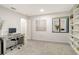 Office with built-in bookshelves, desk, and lots of light at 2155 Harbourside Dr # 804, Longboat Key, FL 34228