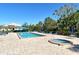 Relaxing community pool and hot tub with lounge chairs and tables on a sunny day at 2155 Harbourside Dr # 804, Longboat Key, FL 34228