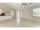 Open living area with kitchen views and tile floors at 2324 Springhaven Ln, Bradenton, FL 34211