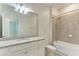 Bathroom with granite countertop, bathtub, and shower at 2324 Springhaven Ln, Bradenton, FL 34211