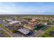 Wide aerial view showcasing the condo building and its surroundings at 2395 Harbor Blvd # 314, Port Charlotte, FL 33952