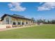 Community lawn bowling green and clubhouse at 2467 E Del Webb Blvd, Sun City Center, FL 33573