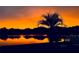 Stunning sunset view over the lake at 2603 River Woods Dr, Parrish, FL 34219