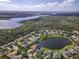 Aerial view of the house and surrounding neighborhood at 2603 River Woods Dr, Parrish, FL 34219