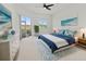 Beautiful bedroom with natural light, soothing decor, and serene outdoor views at 2603 River Woods Dr, Parrish, FL 34219