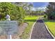 Private walking path for River Woods residents with river views and lush greenery, perfect for enjoying the nature at 2603 River Woods Dr, Parrish, FL 34219