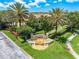 Aerial view of Parkridge community with palm trees and landscaping at 3601 Parkridge Cir # 12-104, Sarasota, FL 34243