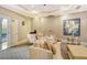 Comfortable lounge area with seating and a coffee bar at 415 L Ambiance Dr # C703, Longboat Key, FL 34228