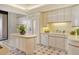 Updated kitchen with white cabinetry and granite countertops at 415 L Ambiance Dr # C703, Longboat Key, FL 34228