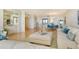 Spacious living area with ocean view and comfortable seating at 415 L Ambiance Dr # C703, Longboat Key, FL 34228