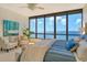 Serene bedroom with ocean views and comfortable furnishings at 415 L Ambiance Dr # C703, Longboat Key, FL 34228