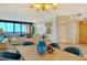 Bright dining room with hardwood floors and ocean view at 415 L Ambiance Dr # C703, Longboat Key, FL 34228