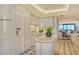 Modern kitchen features updated appliances and an island at 415 L Ambiance Dr # C703, Longboat Key, FL 34228