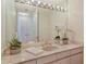 Elegant bathroom with updated vanity and large mirror at 415 L Ambiance Dr # C703, Longboat Key, FL 34228