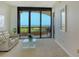 Light-filled living area showcasing a stunning ocean view at 415 L Ambiance Dr # C703, Longboat Key, FL 34228