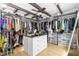 Large walk-in closet with ample hanging space and drawers at 4403 Pike Ave, Sarasota, FL 34233