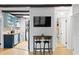 Bright kitchen with granite countertops, blue cabinets, and modern appliances at 4403 Pike Ave, Sarasota, FL 34233
