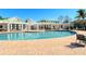 Inviting pool area with pergola and lounge chairs at 4802 51St W St # 908, Bradenton, FL 34210