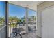 Enjoy a screened balcony overlooking the parking lot and other buildings at 4802 51St W St # 908, Bradenton, FL 34210