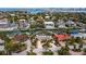 Wide aerial view showing home's location in a waterfront community at 526 N Spoonbill Dr, Sarasota, FL 34236