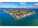 Island community aerial view, showcasing waterfront homes at 526 N Spoonbill Dr, Sarasota, FL 34236