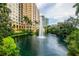 Tranquil fountain and pond area with lush landscaping at 750 N Tamiami Trl # 912, Sarasota, FL 34236