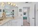 Bathroom with corner vanity and view of bedroom at 806 Mcarthur Ave, Sarasota, FL 34243