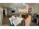 Open floor plan flows from the dining area and kitchen to the inviting living room at 2271 50Th Street E Cir, Palmetto, FL 34221