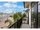 Private balcony with neighborhood and partial water view at 243 S Harbor Dr, Holmes Beach, FL 34217