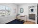 Bright bedroom with built-in dresser and ensuite bathroom access at 243 S Harbor Dr, Holmes Beach, FL 34217