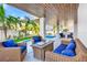 Relaxing pool area with wicker furniture and fire pit at 243 S Harbor Dr, Holmes Beach, FL 34217