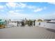 Spacious rooftop deck with stunning neighborhood and water views at 243 S Harbor Dr, Holmes Beach, FL 34217