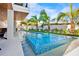Inviting pool with mosaic tile and spa, perfect for relaxation at 243 S Harbor Dr, Holmes Beach, FL 34217