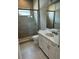 Modern bathroom with shower, toilet and vanity at 24732 Buckingham Way, Port Charlotte, FL 33980