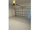 Garage with epoxy coated floor at 24732 Buckingham Way, Port Charlotte, FL 33980